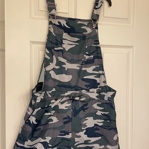 Size medium, camo shortalls, new, never worn.